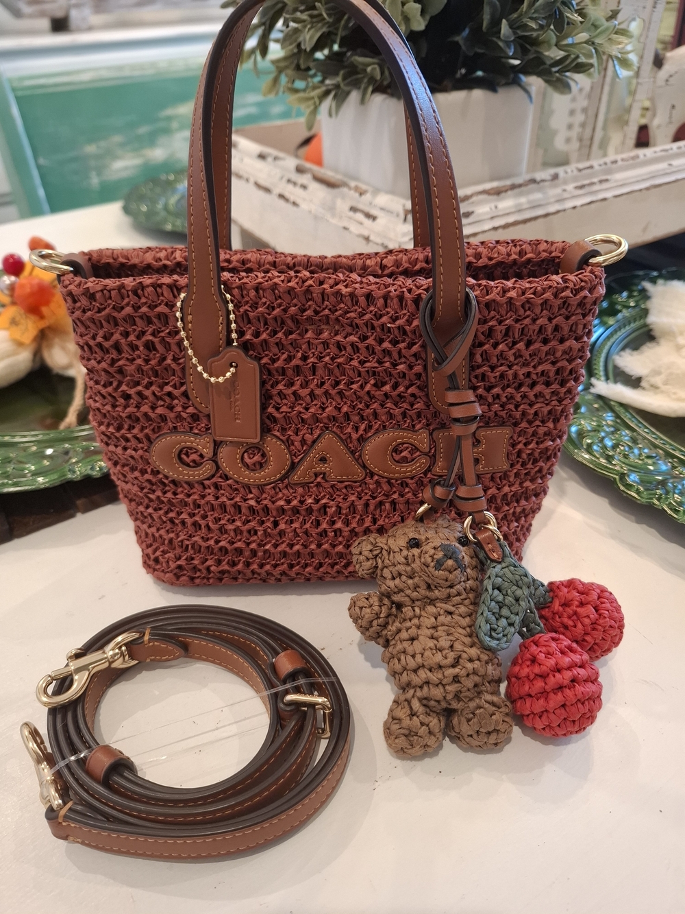 Coach Rust Brown Woven Tote with Teddy & Cherry Charm